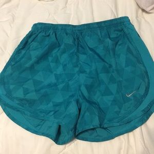Teal patterned Nike shorts